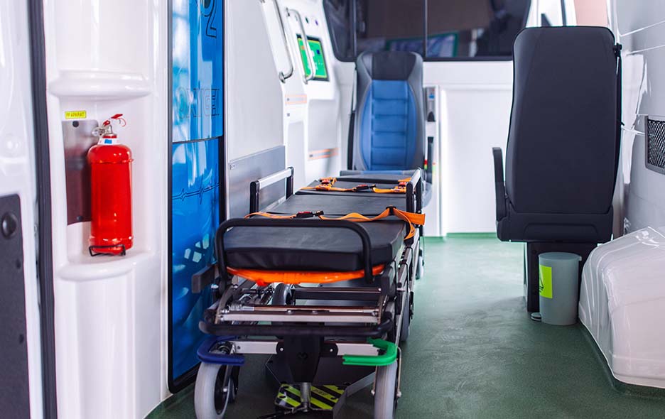 Stretcher in the back of a non-emergency transport vehicle